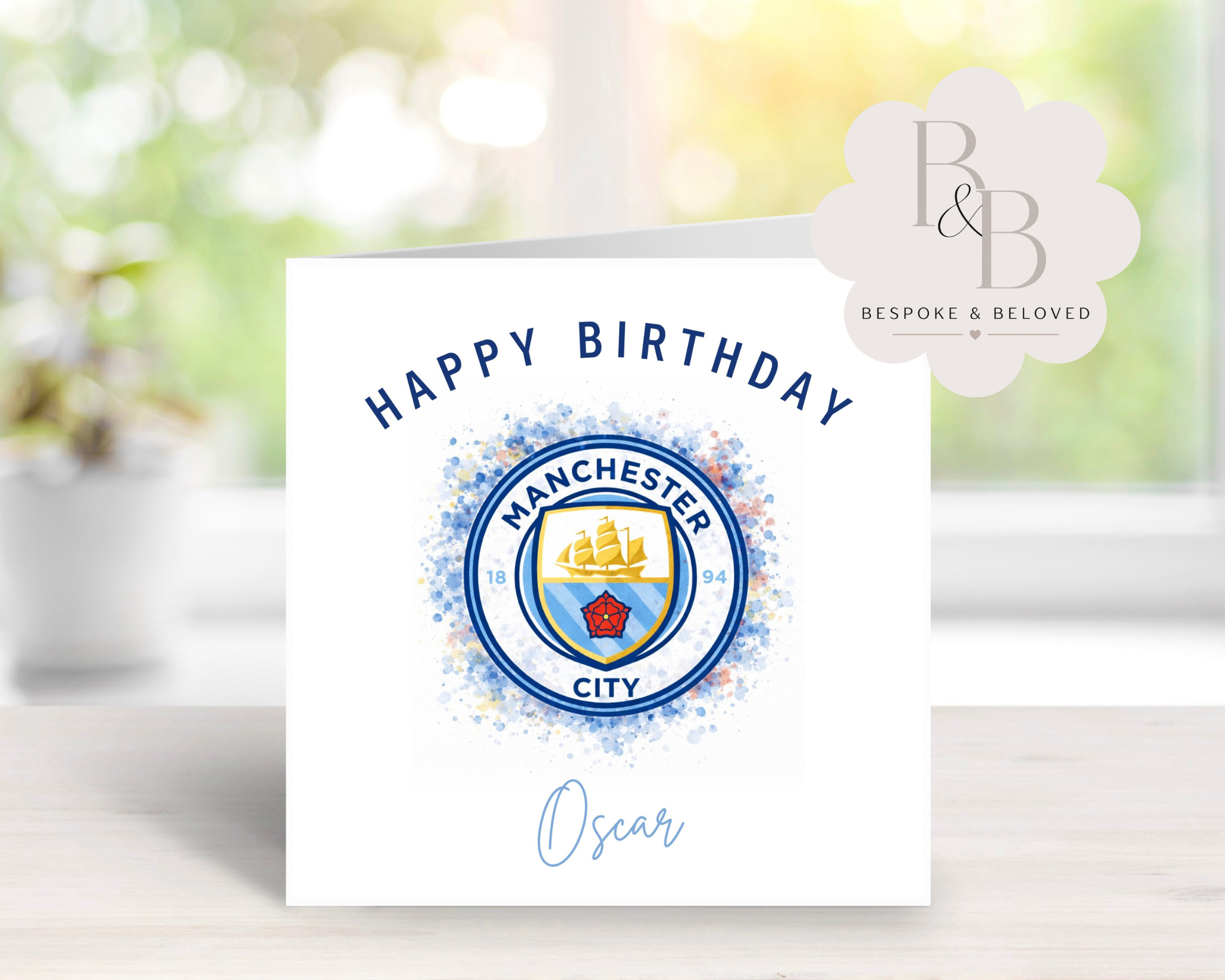 Birthday card with Manchester City logo and 'Happy Birthday' text 