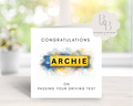 Greeting card with a license plate design and text congratulating on passing a driving test