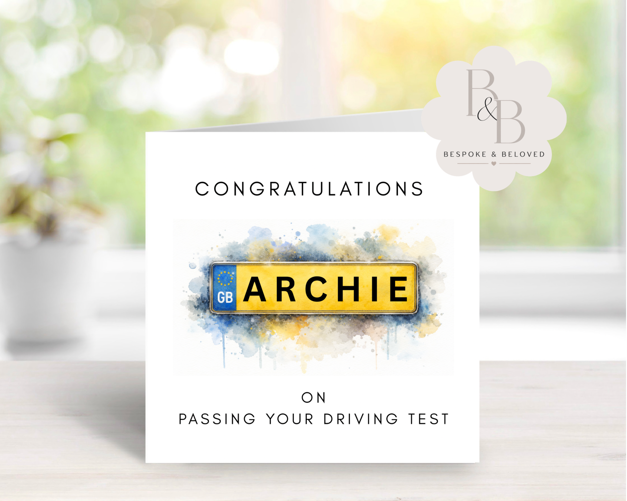 Greeting card with a license plate design and text congratulating on passing a driving test