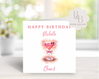Birthday card with a pink cocktail illustration and 'Happy Birthday'  text