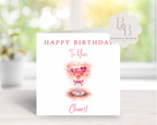 Birthday card with a pink cocktail illustration and 'Happy Birthday' text