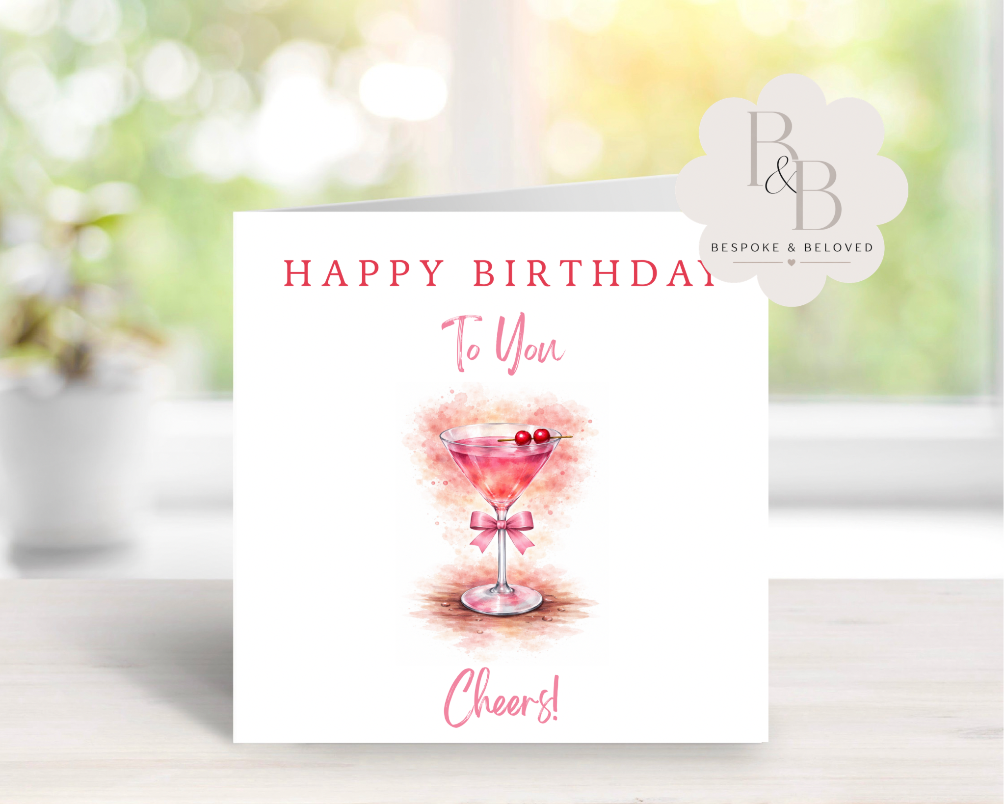 Birthday card with a pink cocktail illustration and 'Happy Birthday' text